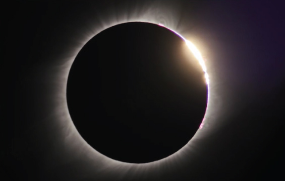 A solar eclipse showing the Baily's Beads phenomenon.
