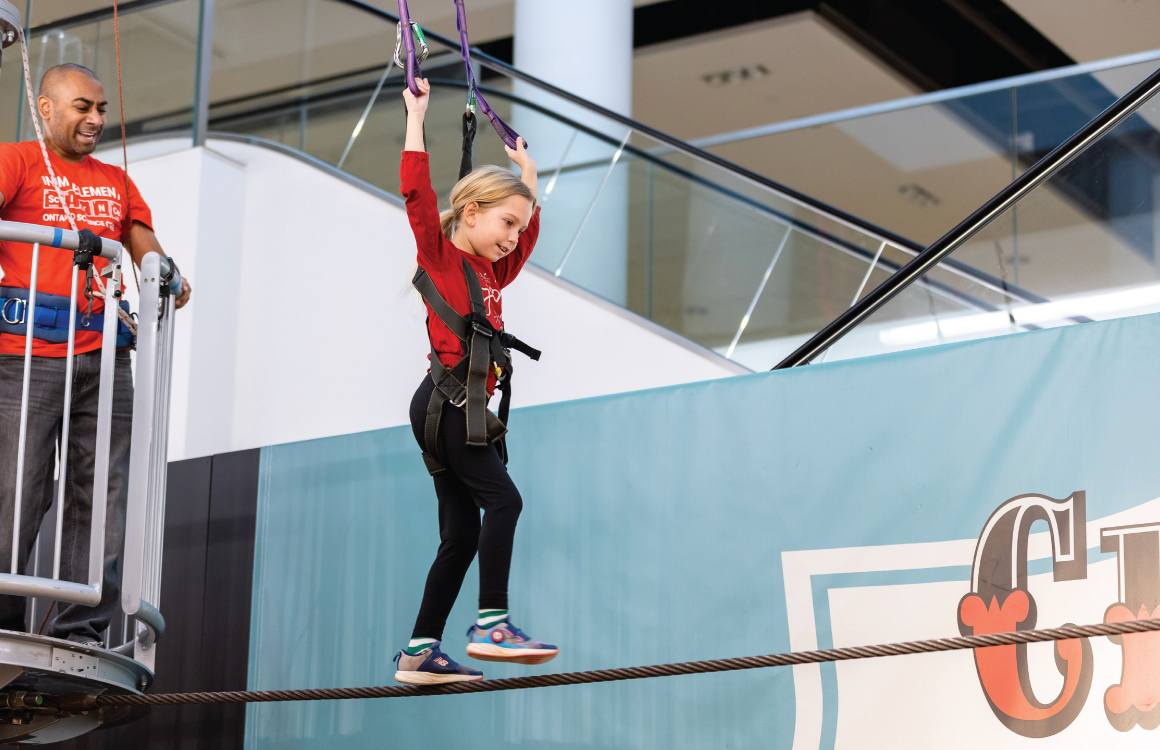 Girl walking on the tight rope