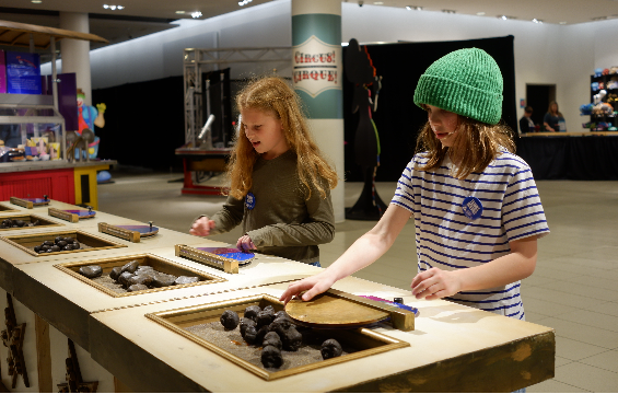 Two girls playing with Circus exhibits at CF Sherway Gardens.